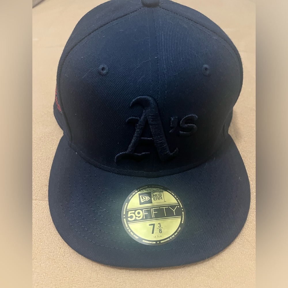 New era 59fifty fitted A’s cap…. 7 3/8